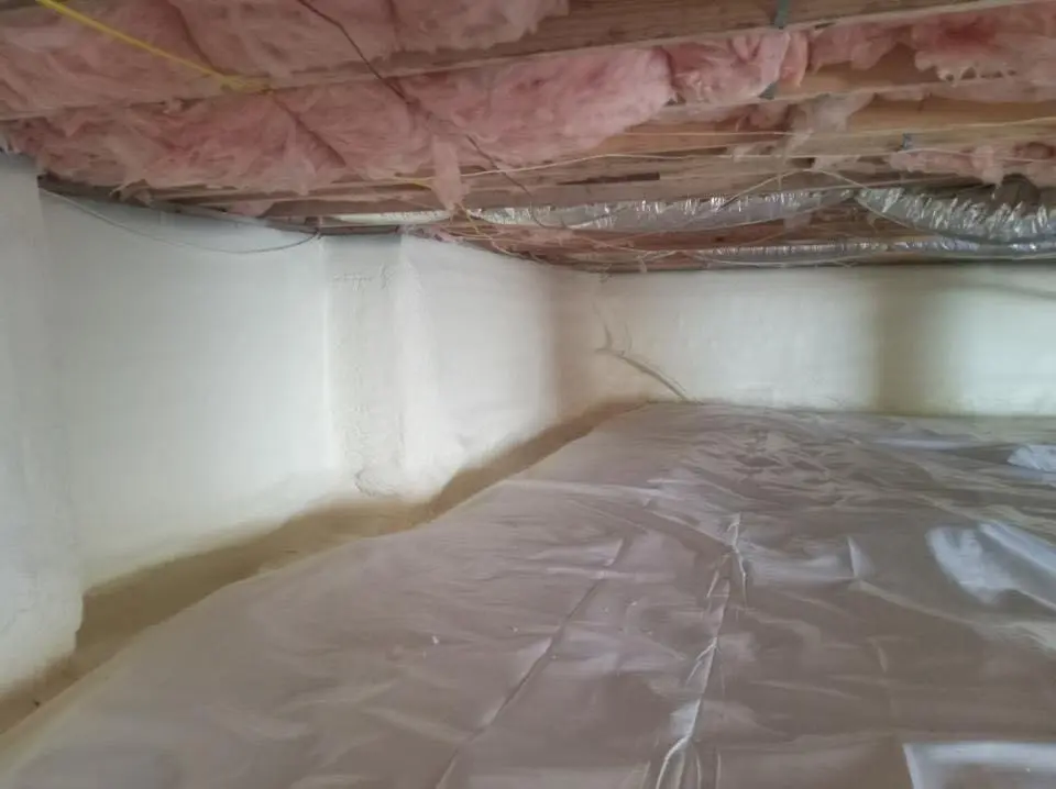 Crawl space encapsulation with closed-cell spray foam for Commercial Roof Restoration in Hoover